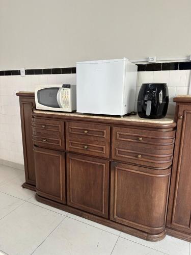 Dapur atau dapur kecil di Apartamento a 5 min Inhotim - COM GARAGEM