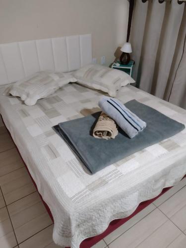 Katil atau katil-katil dalam bilik di Casa estilo Loft com 70m2 próximo das praias
