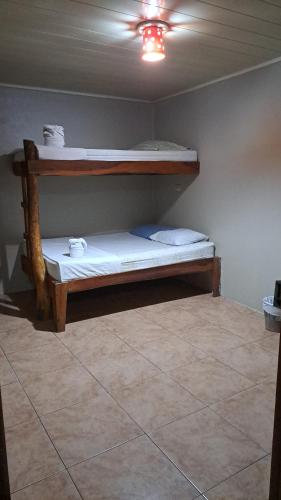 a bunk bed in a room with a ceiling at Gringo Petes Too in Fortuna