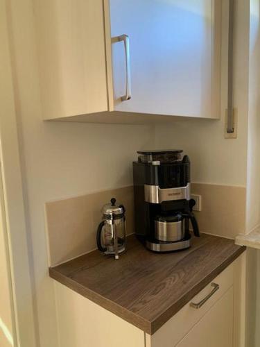 a coffee maker on a counter in a kitchen at Haus Tala in Marquartstein