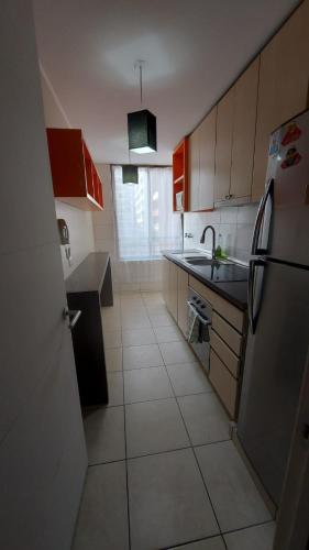 Cuisine ou kitchenette dans l'établissement Lindo departamento hasta 6 personas, estacionamiento