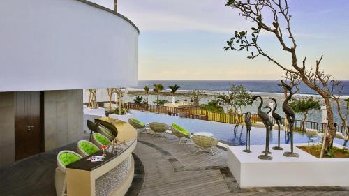 Bazén v ubytování Samabe Bali Villas nebo v jeho okolí