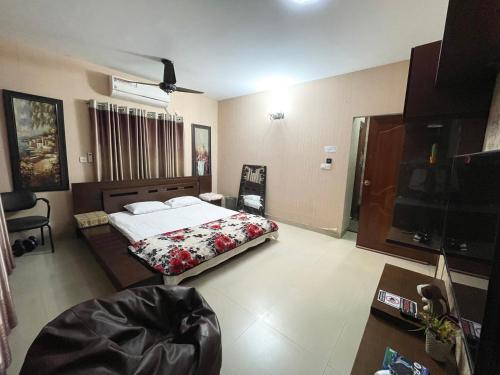 Ένα ή περισσότερα κρεβάτια σε δωμάτιο στο Lakeview Apartment UTTARA Dhaka City Centre