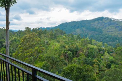 a balcony with a view of a mountain at Tea Hills Ella in Ella