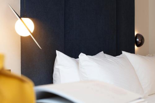 Postel nebo postele na pokoji v ubytování Mcsrh Hotel-Chongqing Jiefangbei Chaotianmen