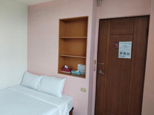 Cama o camas de una habitación en 彩靈的家民宿Caitlyn Hostel