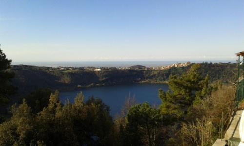 a view of a lake from a hill at Vistalago Guesthouse in Nemi