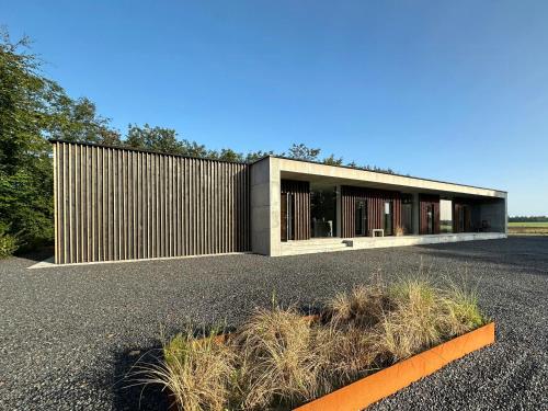 a building on the side of a road at Hotel Vibe In Architectural Settings in Årre
