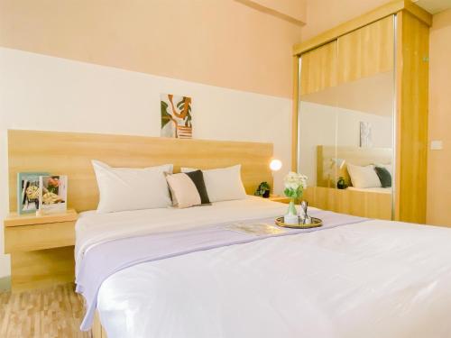 Postel nebo postele na pokoji v ubytování Nice Studio at Parkland Avenue Apartment By Travelio