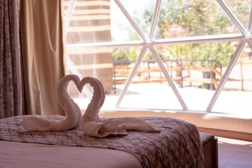 Letto o letti in una camera di Al Sultana Luxury Camp