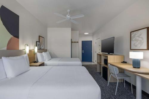 Ein Bett oder Betten in einem Zimmer der Unterkunft Spark by Hilton Nacogdoches