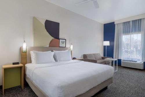 Ein Bett oder Betten in einem Zimmer der Unterkunft Spark by Hilton Nacogdoches