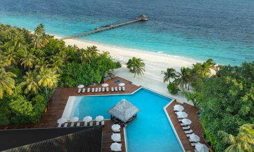an aerial view of a resort with a swimming pool and the beach at Adaaran Select Meedhupparu - with Dine around Premium All inclusive - 24 hours in Meedhoo