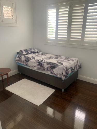 Ένα ή περισσότερα κρεβάτια σε δωμάτιο στο Bushland on the Beach