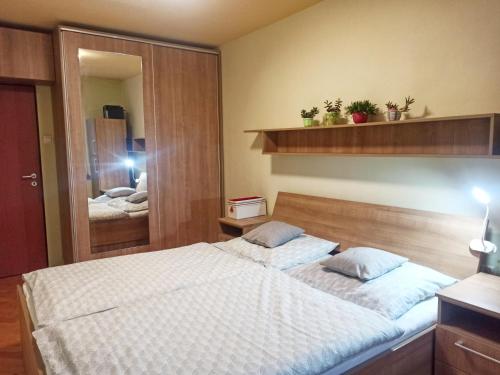 Postel nebo postele na pokoji v ubytování Apartmán na Perunské