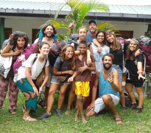 a group of people posing for a picture at A4 Villa Safari Cottage in Udawalawe
