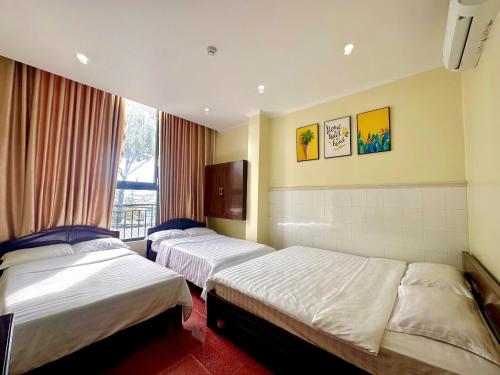 Postel nebo postele na pokoji v ubytování 31B Hotel - Near Ninh Kieu Wharf