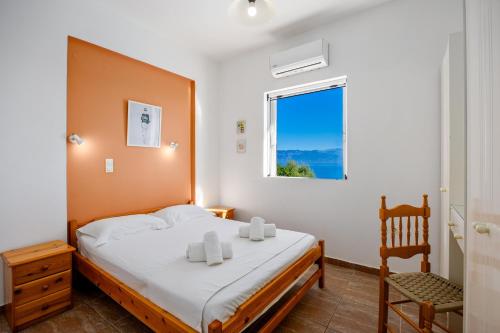 Postel nebo postele na pokoji v ubytování Villa Thalia