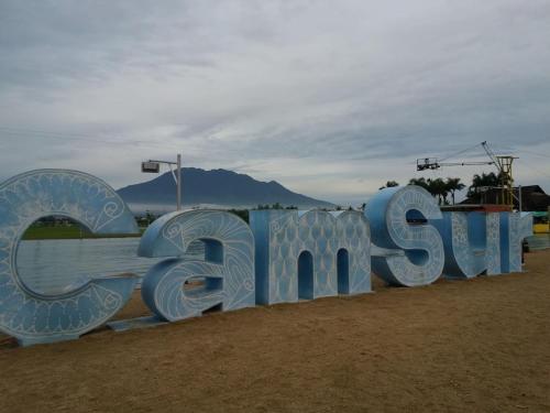 a large blue sign that says sea salt at RedDoorz near Colgante Bridge Naga City in Naga