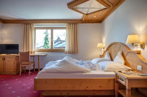 Postel nebo postele na pokoji v ubytování Hotel Bellavista