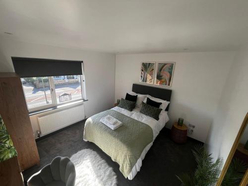 Ένα ή περισσότερα κρεβάτια σε δωμάτιο στο Gorgeous 1 bedroom property, close walk to Goodrington beach