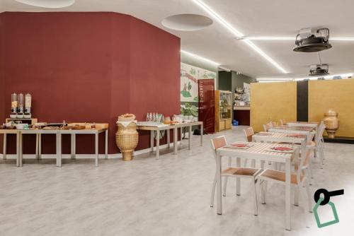 Restaurant ou autre lieu de restauration dans l'établissement HOTIDAY Apartment Collection - La Spezia