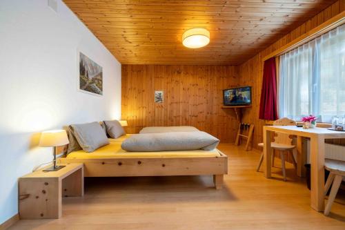 Postel nebo postele na pokoji v ubytování Garni Alpenrose - Grusaida