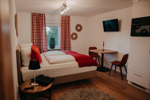 Ένα ή περισσότερα κρεβάτια σε δωμάτιο στο Eichel Apartments