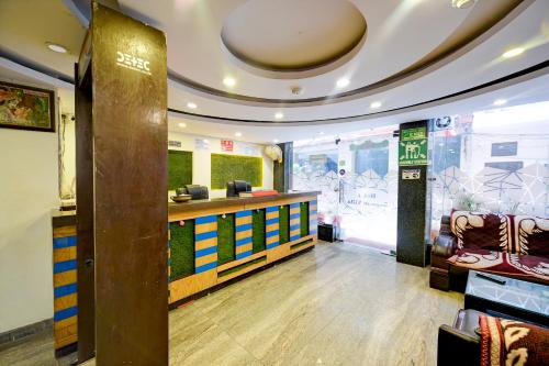 a lobby of a store with a reception counter at Hotel Re Pose Villa Walking Distance From New Delhi Railway Station and R K Ashram Metro Station in New Delhi