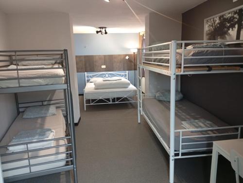 Una cama o camas en una habitación de Belevingshoeve " de Smishoeve"