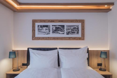 Cama o camas de una habitación en Val Saraina Apartments