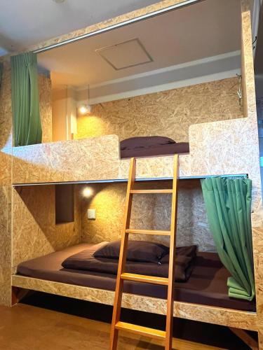 Postel nebo postele na pokoji v ubytování Green Guesthouse