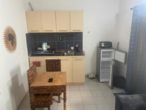 Kuchyň nebo kuchyňský kout v ubytování Le studio du centre