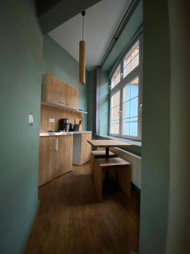 Kuchyň nebo kuchyňský kout v ubytování Singer109 Hostel, Hotel & Apartment