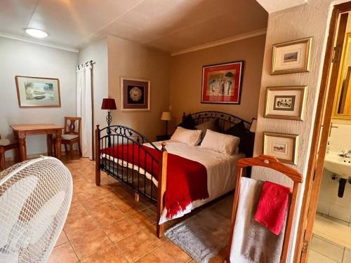 Ένα ή περισσότερα κρεβάτια σε δωμάτιο στο Guest House Oaktree fourways