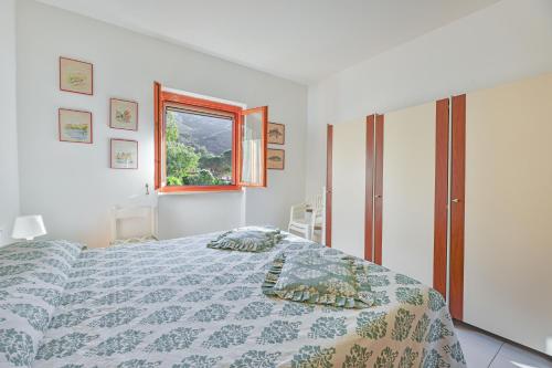 Katil atau katil-katil dalam bilik di Cala Rossa 40 Pool & Relax - Goelba