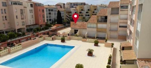 Photo de la galerie de l'établissement Au cœur du cap studio-terasse-piscine-mer, au Cap d'Agde