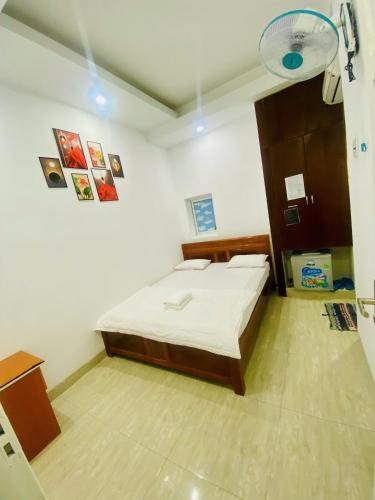 Ένα ή περισσότερα κρεβάτια σε δωμάτιο στο Hotel thiên ý