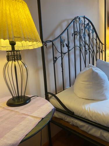 Кровать или кровати в номере Hotel Alte Försterei