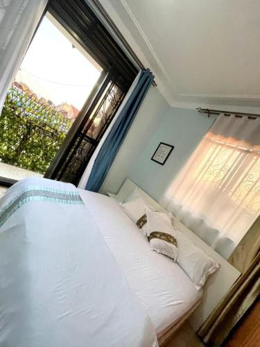 Voodi või voodid majutusasutuse Satos cozy crib toas