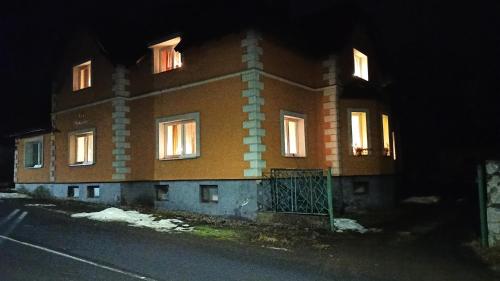 a building at night with its lights on at Vila Slunečnice in Vejprty