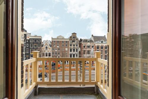 a view of a city from a window at Appartement Rokin in Amsterdam