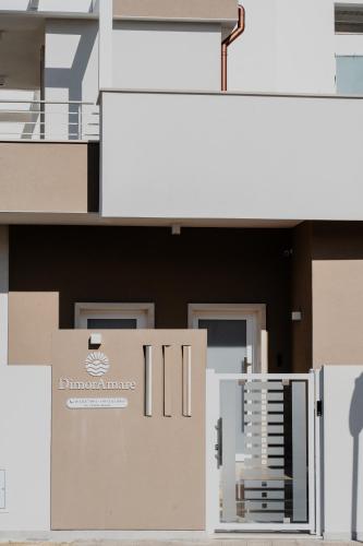 a front view of a building with a door at DimorAmare in Bari