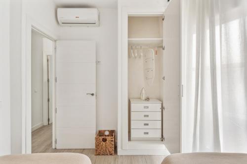 Posteľ alebo postele v izbe v ubytovaní Epidemia & quite bedrooms by ELE Apartments