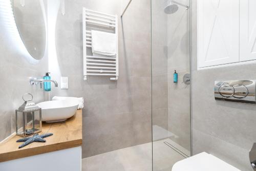 Ένα μπάνιο στο Apartamenty Nad Zatoką DeLuxe