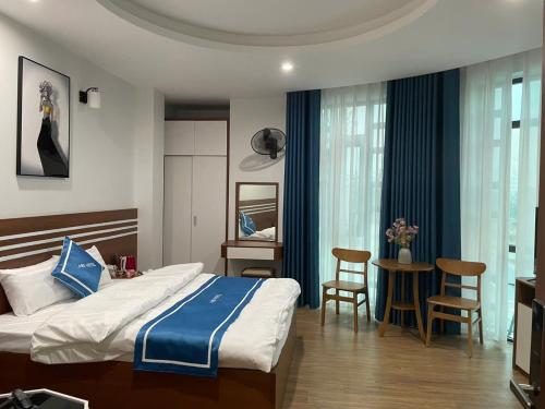 Postel nebo postele na pokoji v ubytování A90 hotel