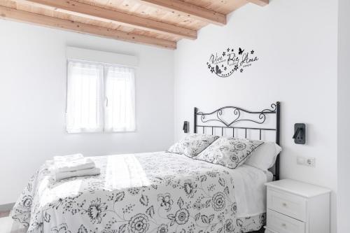 Postel nebo postele na pokoji v ubytování Oviedo Rural