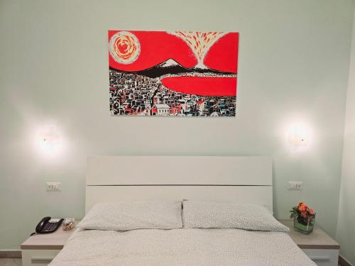 A bed or beds in a room at Maison Carolina