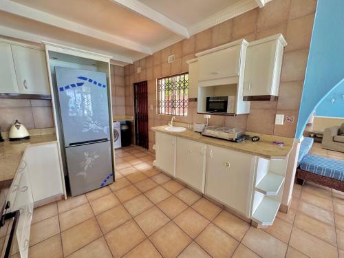 Η κουζίνα ή μικρή κουζίνα στο 26 Colwyn Drive , Sheffield