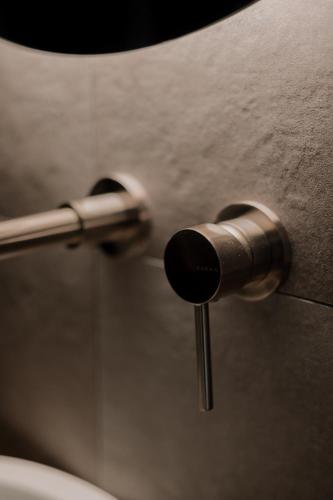 a close up of a bathroom stall with a sink at Neutral Haven in Nafplio